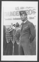 Photograph of Captain Dale Cooke speaking to the press at Nellis Air Force Base, Nevada, January 20, 1982