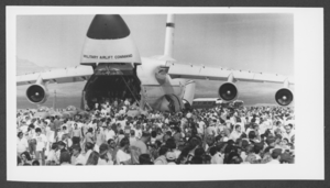 Photograph of people looking at a C-5 Galaxy military transport aircraft jet at Nellis Air Force Base, Nevada, October 14, 1979