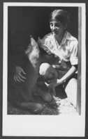 Photograph of Montyce Hackett and a newborn colt, Nellis Air Force Base, Nevada, June 24, 1976