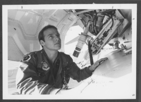 Photograph of military personnel inspecting plane, Nellis Air Force Base, Nevada, circa 1970s