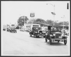 Photograph of old cars riding in a parade, North Las Vegas, Nevada, circa 1960s