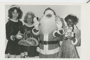 Photograph of North Las Vegas Chamber of Commerce presents Santa and his helpers, North Las Vegas, Nevada, November 25, 1980