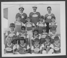 Black-and-white photograph of the Pee Wee "Giants" Little League baseball team and their coaches, North Las Vegas, Nevada, July 28, 1975