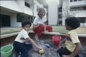 Slide of students with children, University of Nevada, Las Vegas, circa mid 1980s
