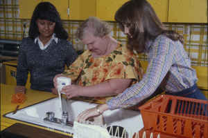 Slide of students with special needs woman, University of Nevada, Las Vegas, circa mid 1980s