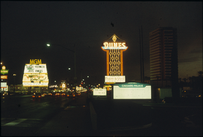 Slide of Dunes Hotel and MGM Grand neon signs, Las Vegas, circa 1983