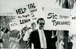 Slide of people carrying protest signs, University of Nevada, Las Vegas, 1968