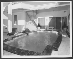 Black-and-white photograph of Wilbur Clark's private swimming pool at his home, Las Vegas, Nevada, circa 1950s