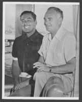 Black-and-white photograph of Wilbur Clark and Errol Flynn, location unknown, circa 1950s