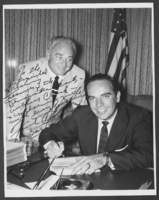 Black-and-white photograph of Wilbur and Toni Clark with Frank Clement, location unknown, July, 1957