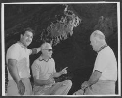 Black-and-white photograph of Wilbur Clark with two unidentified men, location unknown, circa 1950s