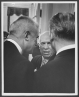 Black-and-white photograph of Russian Premier Nikita Khrushchev at a reception, location unknown, 1959