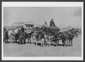 Photograph of people getting ready to boat on the Colorado River, circa early 1900s