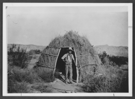 Photograph of Leon Rockwell at an Indian Hogan, circa late 1800s to early 1900s