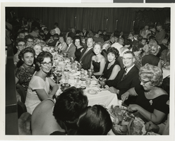 Photograph of a group of people in the Copa Room at the Sands Hotel, Las Vegas, August 23, 1962