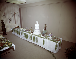 Film transparency of banquet tables with food and decorations at the Sands Hotel in Las Vegas, circa 1965