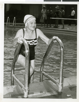 Photograph of an unidentified diving grandmother at the Sands Hotel and Casino, Las Vegas, circa 1965