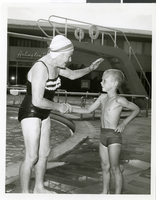 Photograph of an unidentified diving grandmother at the Sands Hotel and Casino, Las Vegas, circa 1965