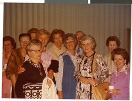 Photograph of a crowd of women posing for a picture, circa 1960s.