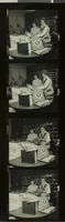 Black-and-white photograph of people inside the James Dickinson Library, Las Vegas, October 1976