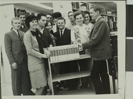 Photograph of individuals inside James Dickinson Library, University of Nevada, Las Vegas, March 31, 1966