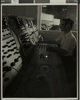 Photograph of Tony Messina (student), inside television studio control room, Las Vegas, circa 1969