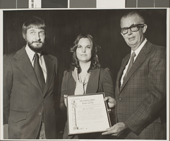 Photograph of the signing of the Phi Lambda Alpha Charter, University of Nevada, Las Vegas, November 18, 1975