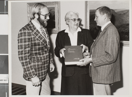 Photograph of individuals inside James Dickinson Library, University of Nevada, Las Vegas, circa late 1980s