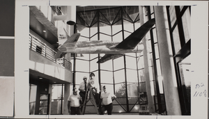 Photograph of replica H-1 racer airplane hanging, University of Nevada, Las Vegas, circa 1988