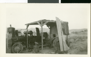 Photograph of car in the desert, circa early 1900s