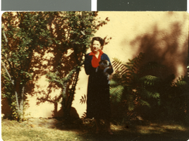 Slide of Maurine Wilson and her cat, circa 1950s