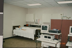 Photograph of a hospital bed with a dummy, University of Nevada, Las Vegas, circa 1991-1992