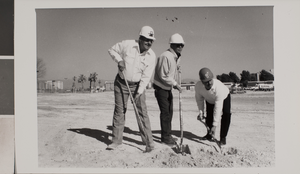 Photograph of men breaking ground, University of Nevada, Las Vegas, circa 1991-1992