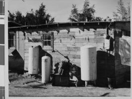 Photograph of a shack house in West Las Vegas, located at 1421 H Street, Las Vegas, Nevada, October, 1957
