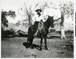 Photograph of a young Paiute/Shoshone Indian astride a black horse, Pahrump, Nevada, circa 1880s-1890s