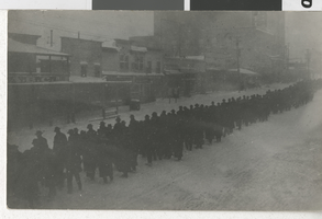 Postcard of a parade on Main Street in Tonopah, Nevada, circa 1900s-1910s