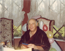 Photograph of Jay Sarno surrounded by balloons, June 1982