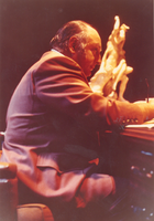 Photograph of Jay Sarno seated at a desk, 1971