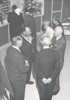 Photograph of group of people in a hotel lobby, 1960s