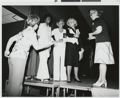 Photograph of conference leaders conferring over election results, Las Vegas (Nev.), June 19, 1977
