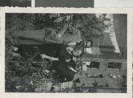 Photograph of Lloyd Katz with his parents, 1940s-1950s