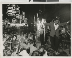 Photograph of a band entertaining a crowd on Fremont Street, Las Vegas (Nev.), 1956
