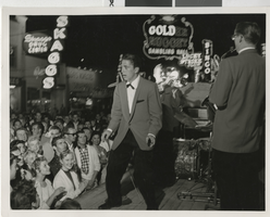 Photograph of a band entertaining a crowd on Fremont Street, Las Vegas (Nev.), 1956