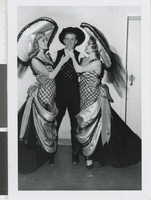 Photograph of two showgirls with a cowboy dancer, Las Vegas (Nev.), 1957-1960s