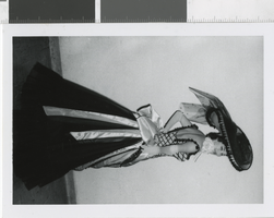 Photograph of costumed showgirl posing backstage, Las Vegas (Nev.), 1957-1960s