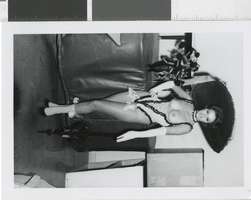 Photograph of topless showgirl backstage, Las Vegas (Nev.), 1957-1960s