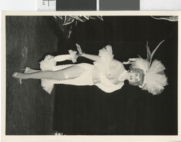 Photograph of topless showgirl posing onstage, Las Vegas (Nev.), 1957-1960s