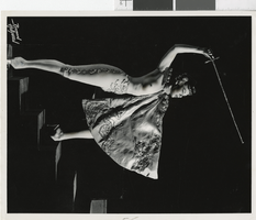 Photograph of topless showgirl posing onstage, Las Vegas (Nev.), 1957-1960s