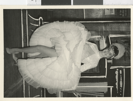 Photograph of a dancer wearing a costume with layered petticoats, Dunes Hotel, Las Vegas (Nev.), 1957-1960s