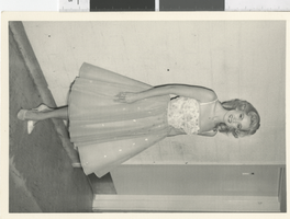 Photograph of a performer wearing a mid-length gown, Dunes Hotel, Las Vegas (Nev.), 1957-1960s